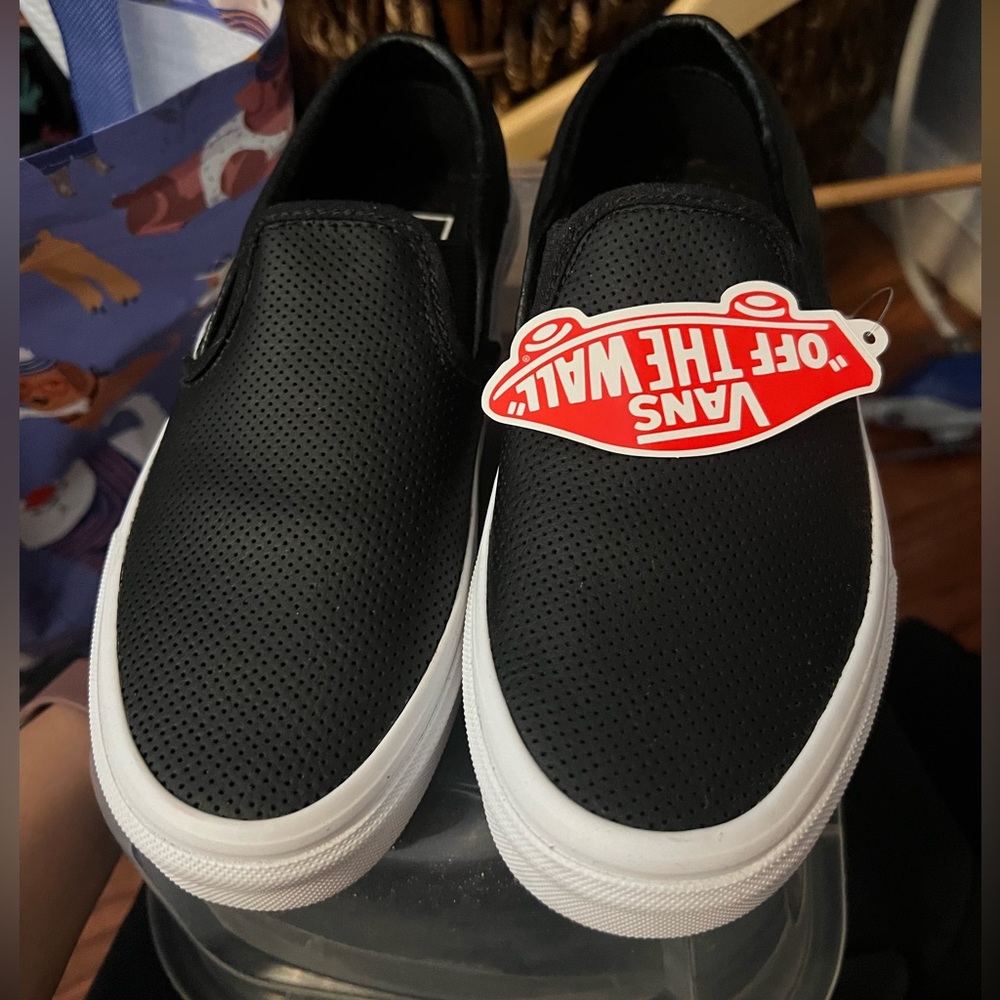 Black vans NEVER worn.